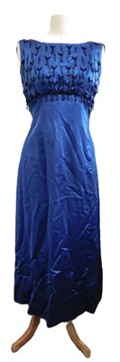 Lot 50 - A blue evening gown by Julian Rose, the full...