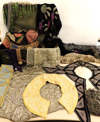 Lot 205 - A suitcase of assorted vintage beading, trims,...