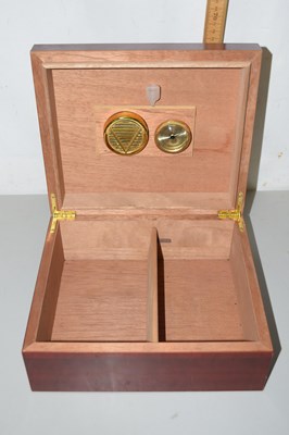 Lot 55 - A small humidor cigar cabinet