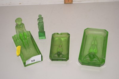 Lot 59 - A group of early 20th Century green glass...