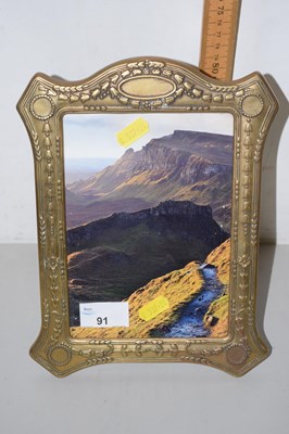 Lot 91 - A brass easel back picture frame