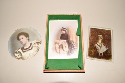 Lot 102 - A portrait photograph on porcelain back...