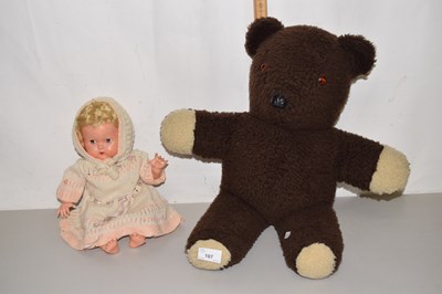 Lot 107 - Vintage teddy bear and a vintage plastic...
