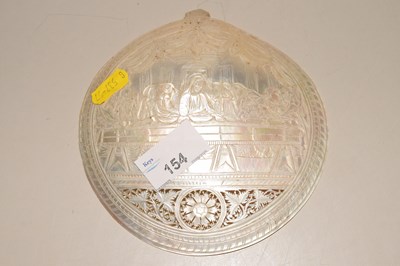 Lot 154 - A carved mother of pearl shell depicting The...