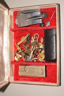 Lot 158 - A box of various pin badges, cigarette...