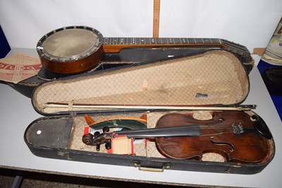Lot 194 - A vintage six string banjo with mother of...
