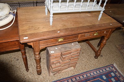 Lot 364 - A 19th Century oak two drawer table raised on...