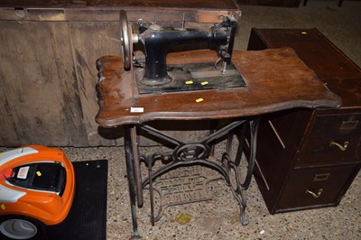 Lot 391 - A vintage Bradbury treadle sewing machine