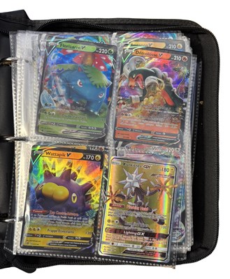 Lot 284 - A folder of contemporary holographic Pokemon...