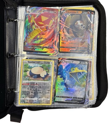 Lot 285 - A folder of contemporary holographic Pokemon...