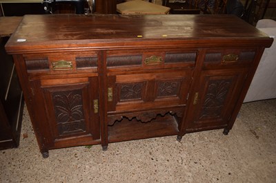 Lot 393 - Late Victorian sideboard with three drawers...