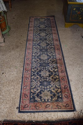 Lot 403 - A modern floral pattern runner carpet