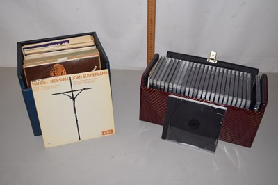 Lot 517 - Assorted singles and a box of CD cases