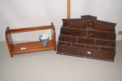 Lot 535 - A letter rack and a book rack