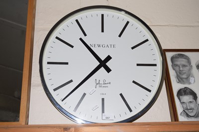 Lot 557 - A John Lewis wall clock