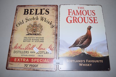 Lot 596 - Two reproduction metal whisky signs