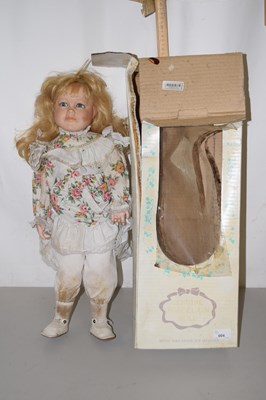 Lot 604 - A collectors doll, boxed
