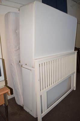 Lot 718 - A double duvan bed