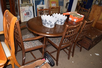 Lot 783 - A modern oak finish dining table and six chairs