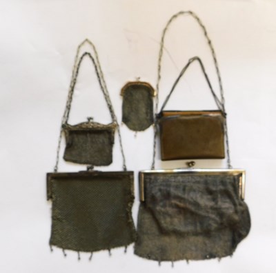 Lot 115 - Five ladies purses, to include a small silver...