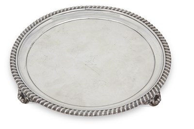 Lot 203 - A George IV silver salver of circular form...