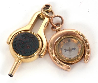 Lot 110 - Two fobs: to include a 9ct compass and...