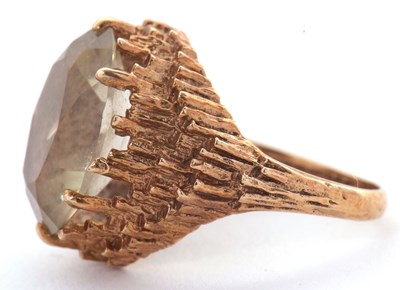 Lot 30 - A 9ct citrine ring, the oval citrine with...