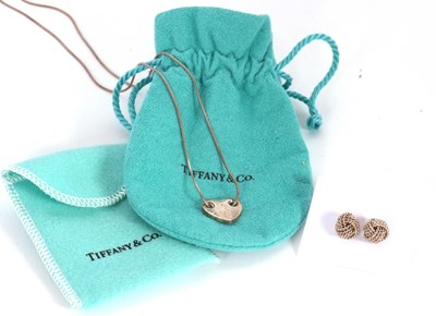 Lot 142 - Tiffany & Co.: a pair of twist knot earrings,...