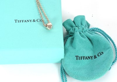 Lot 136 - Tiffany & Co.: a barrel bead necklace, with...