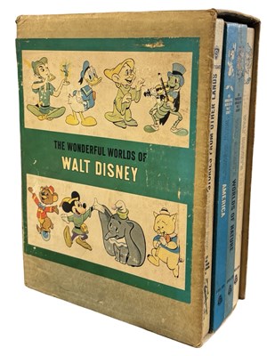 Lot 59 - THE WONDERFUL WORLDS OF WALT DISNEY 4-volumes...