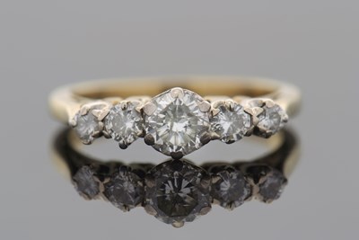 Lot 284 - A five stone diamond ring, the central round...