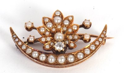 Lot 86 - A seed pearl and diamond brooch, the crescent...