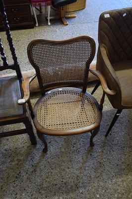 Lot 332 - CANE SEATED AND BACKED EDWARDIAN ARMCHAIR