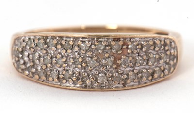 Lot 55 - A diamond ring, the diamond pave set panel,...