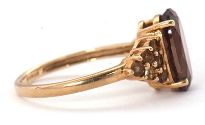 Lot 56 - A 9ct smokey quartz and citrine cluster ring,...
