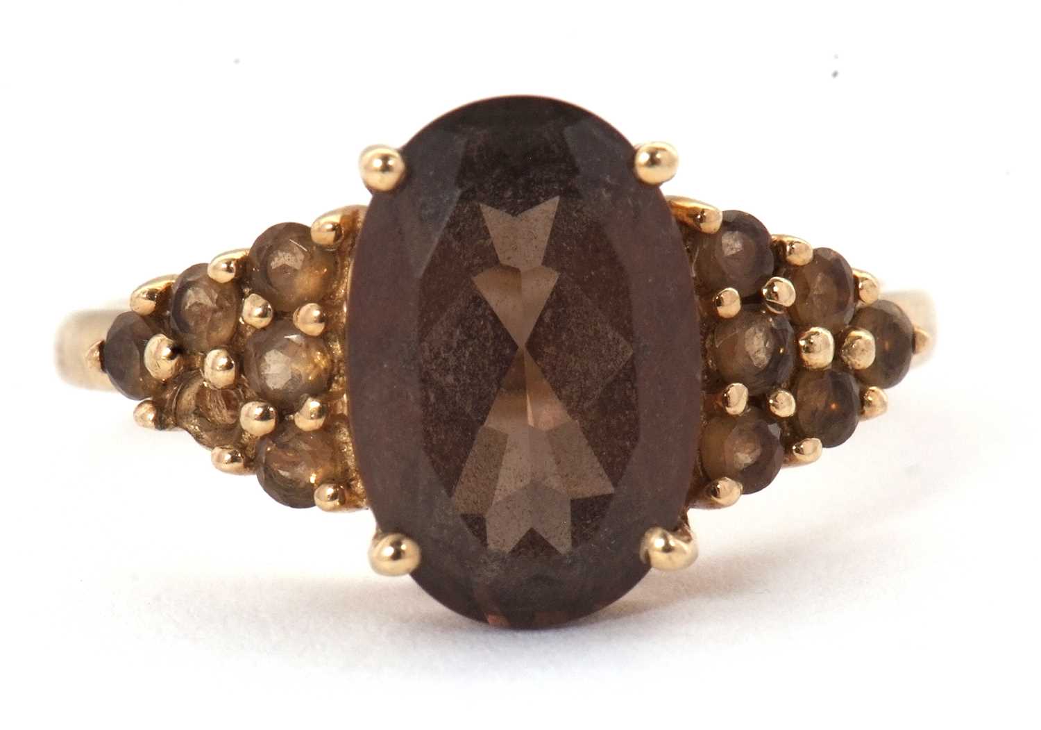 Lot 56 - A 9ct smokey quartz and citrine cluster ring,...