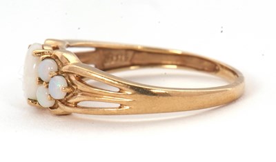 Lot 62 - A 9ct opal ring, with a central oval opal...