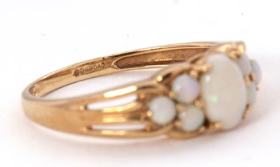 Lot 62 - A 9ct opal ring, with a central oval opal...