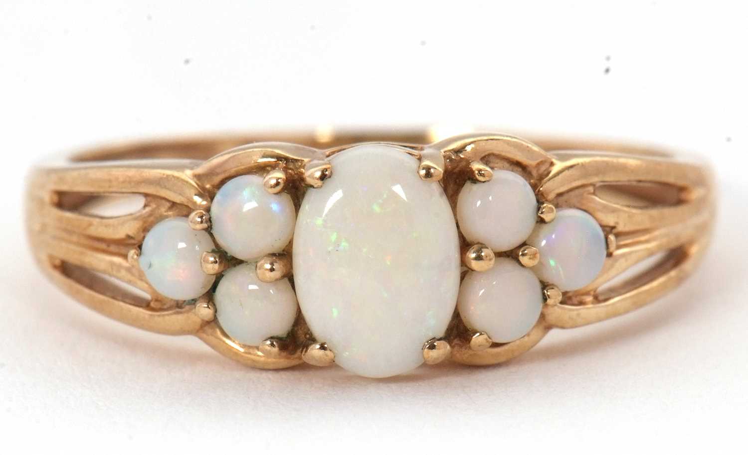 Lot 62 - A 9ct opal ring, with a central oval opal...