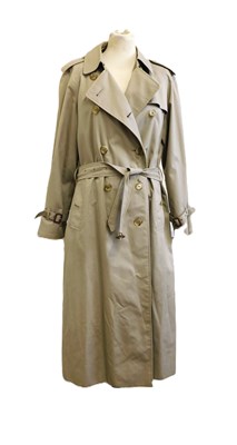 Lot 65 - A lady's Burberry's trench coat, the double...