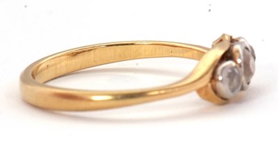 Lot 63 - A three stone diamond ring, set with three...