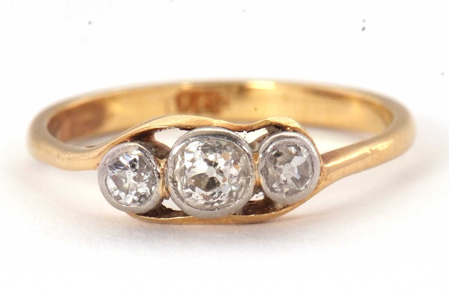 Lot 63 - A three stone diamond ring, set with three...