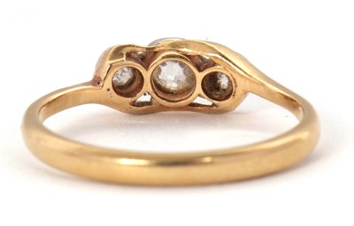 Lot 63 - A three stone diamond ring, set with three...
