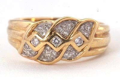 Lot 59 - A diamond ring, set with small round diamonds...