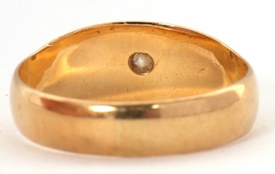 Lot 57 - A single stone diamond ring, with a gypsy set...