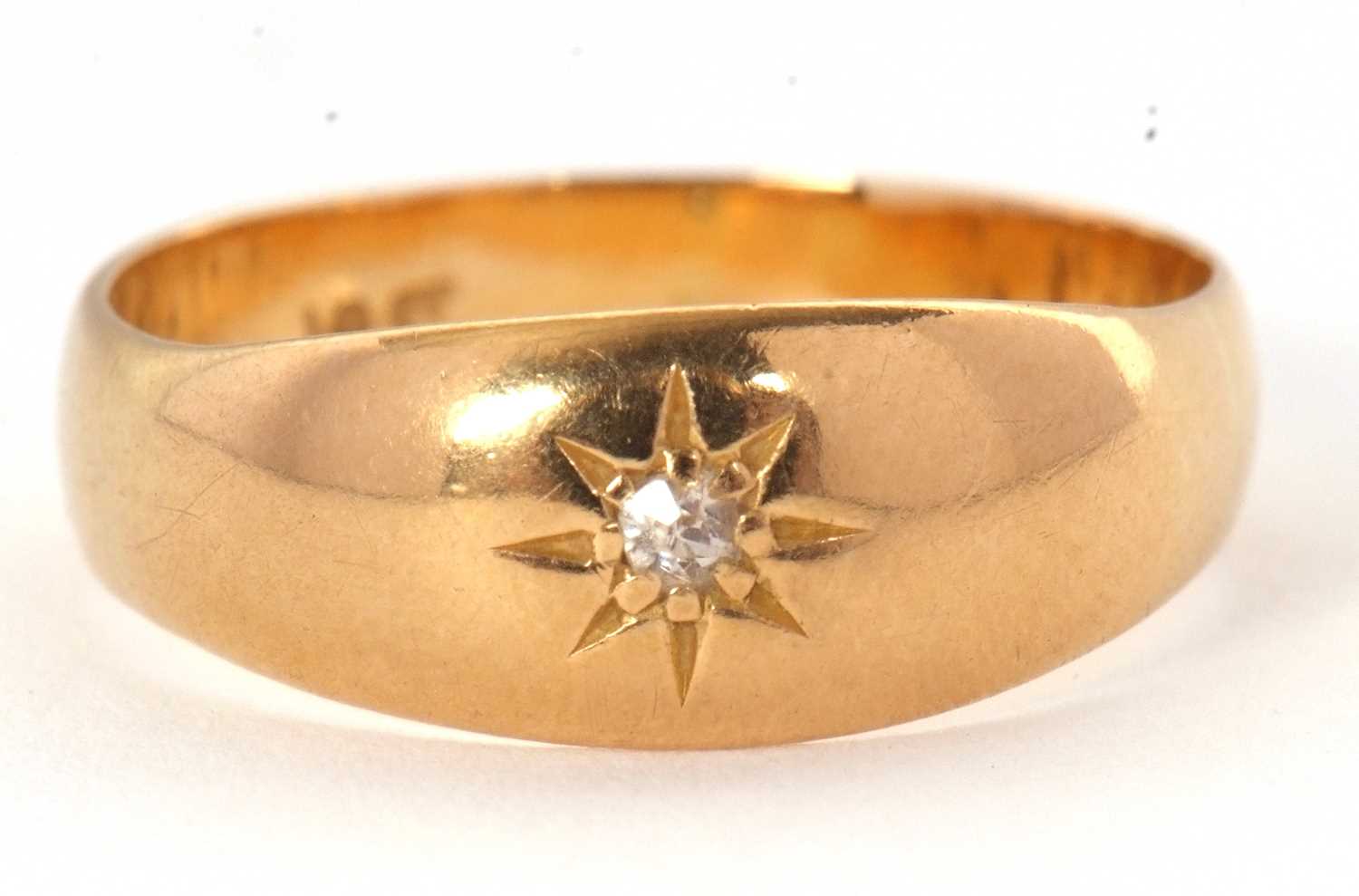 Lot 57 - A single stone diamond ring, with a gypsy set...