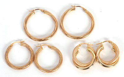 Lot 162 - Three pairs of 9ct earhoops: to include a pair...