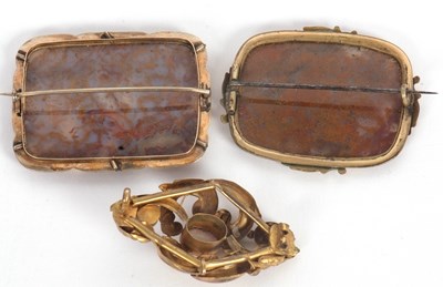Lot 89 - Three brooches: to include an agate specimen...