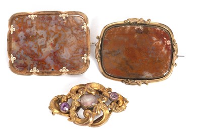 Lot 89 - Three brooches: to include an agate specimen...