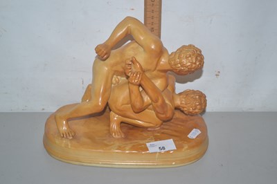 Lot 58 - Ceramic model of Wrestlers